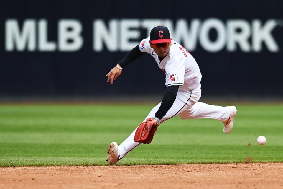 Aug 7, 2024; Cleveland, Ohio, USA; Cleveland Guardians second baseman Andres Gimenez (0) fields a ball hit by Arizona Diamondbacks first baseman Josh Bell (not pictured) during the third inning at Progressive Field. Mandatory Credit: Ken Blaze-USA TODAY Sports