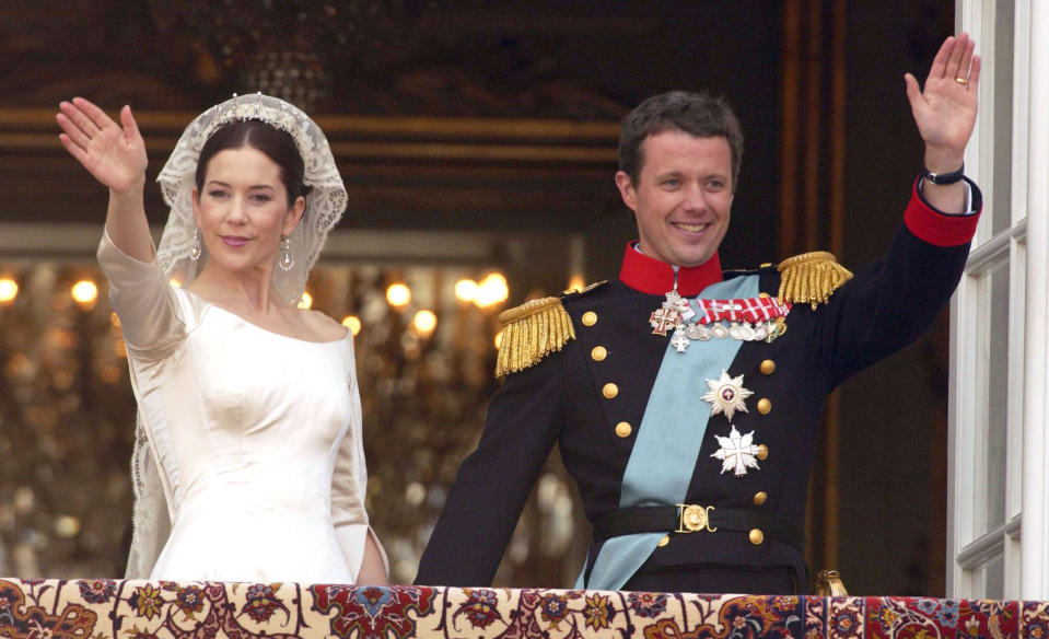 <p>In a story that would not look out of place in a fairy tale, Crown Prince Frederik & Mary Donaldson first met during the 2000 Sydney Olympics. The couple first laid eyes on each other in a pub, as Prince Frederik concealed his royal identity.<br>And after months of long distance phone calls and letters, Mary took the plunge and moved to Denmark to be with Frederik. The couple became officially engaged on October 8, 2003 and wed on May 14, 2004. For the big day, Mary donned a duchesse satin gown by Danish fashion designer Uffe Frank which featured an impressive 19ft train. <em>[Photo: Getty]</em> </p>