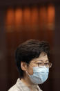 Hong Kong Chief Executive Carrie Lam speaks during a press conference at a polling center for the election committee that will vote for the city's leader in Hong Kong Sunday, Sept. 19, 2021. Hong Kong's polls for an election committee that will vote for the city's leader kicked off Sunday amid heavy police presence, with chief executive Carrie Lam saying that it is "very meaningful" as it is the first election to take place following electoral reforms. (AP Photo/Vincent Yu)