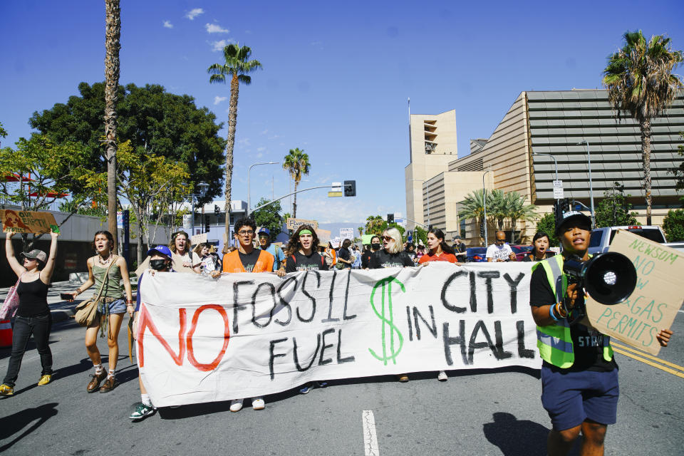 Activists march for the Global Climate Strike in downtown Los Angeles, Sept. 23