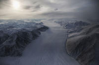 <p>A section of a glacier is seen from NASA’s Operation IceBridge research aircraft on March 29, 2017 above Ellesmere Island, Canada. The ice fields of Ellesmere Island are retreating due to warming temperatures. NASA’s Operation IceBridge has been studying how polar ice has evolved over the past nine years and is currently flying a set of eight-hour research flights over ice sheets and the Arctic Ocean to monitor Arctic ice loss aboard a retrofitted 1966 Lockheed P-3 aircraft. According to NASA scientists and the National Snow and Ice Data Center (NSIDC), sea ice in the Arctic appears to have reached its lowest maximum wintertime extent ever recorded on March 7.Scientists have said the Arctic has been one of the regions hardest hit by climate change. (Mario Tama/Getty Images) </p>