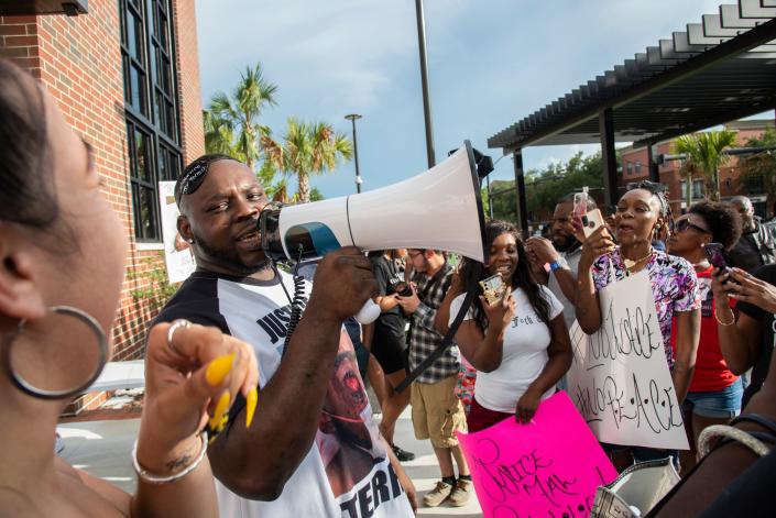 Tevin Bradley, a first cousin of Terrell Bradley, speaks and leads the crowd in chants during a protest for Bradley in Gainesville, Fla., on Sunday, July 17, 2022.