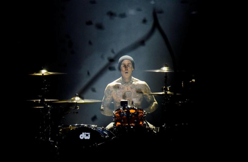 Blink 182 drummer, Travis Barker, performs at the Spectrum Center arena as confetti falls from the ceiling on July, 14, 2023, as part of the band’s world tour.