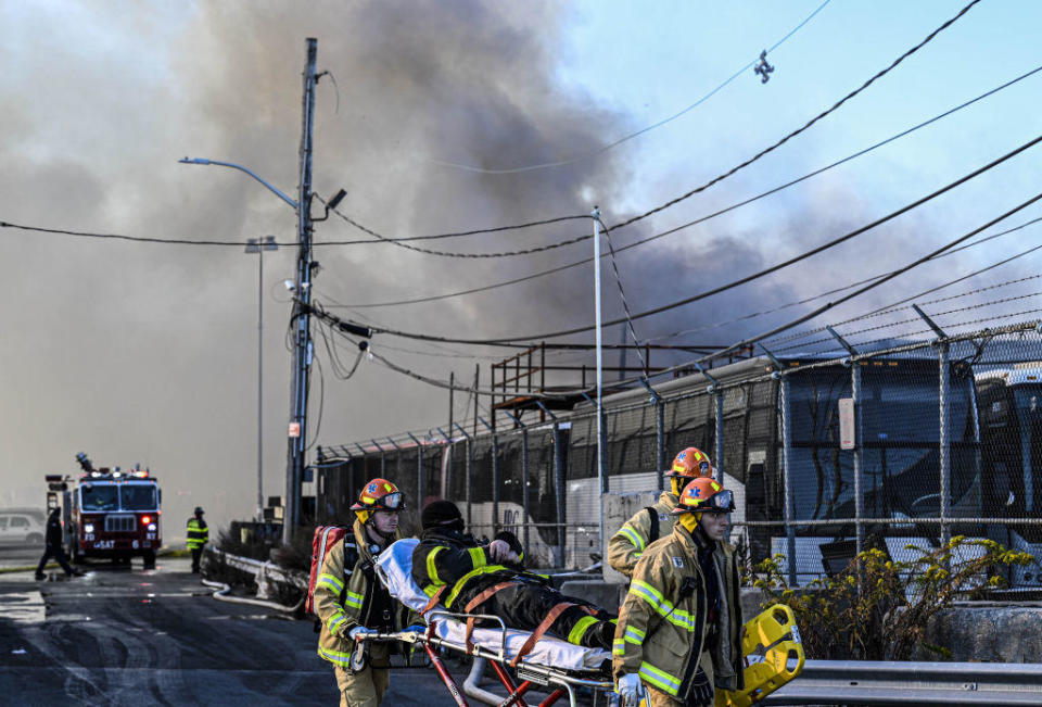 A view of the site as a massive fire broke out at an NYPD impound and evidence storage warehouse in Brooklyn on December 13, 2022 in Brooklyn, United States. / Credit: Fatih Aktas/Anadolu Agency via Getty Images