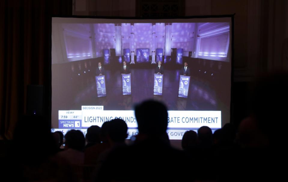 Attendees watched a live feed of the closed first debate of Kentucky's 2023 race for governor in a ballroom at The Henry Clay Building hosted by held by the Jefferson County GOP in Louisville, Ky. on Mar. 7, 2023.  