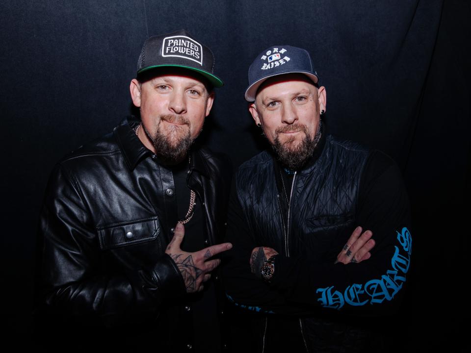 Benji Madden and Joel Madden.