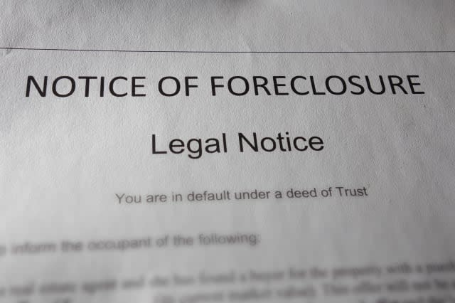 a home foreclosure document on...