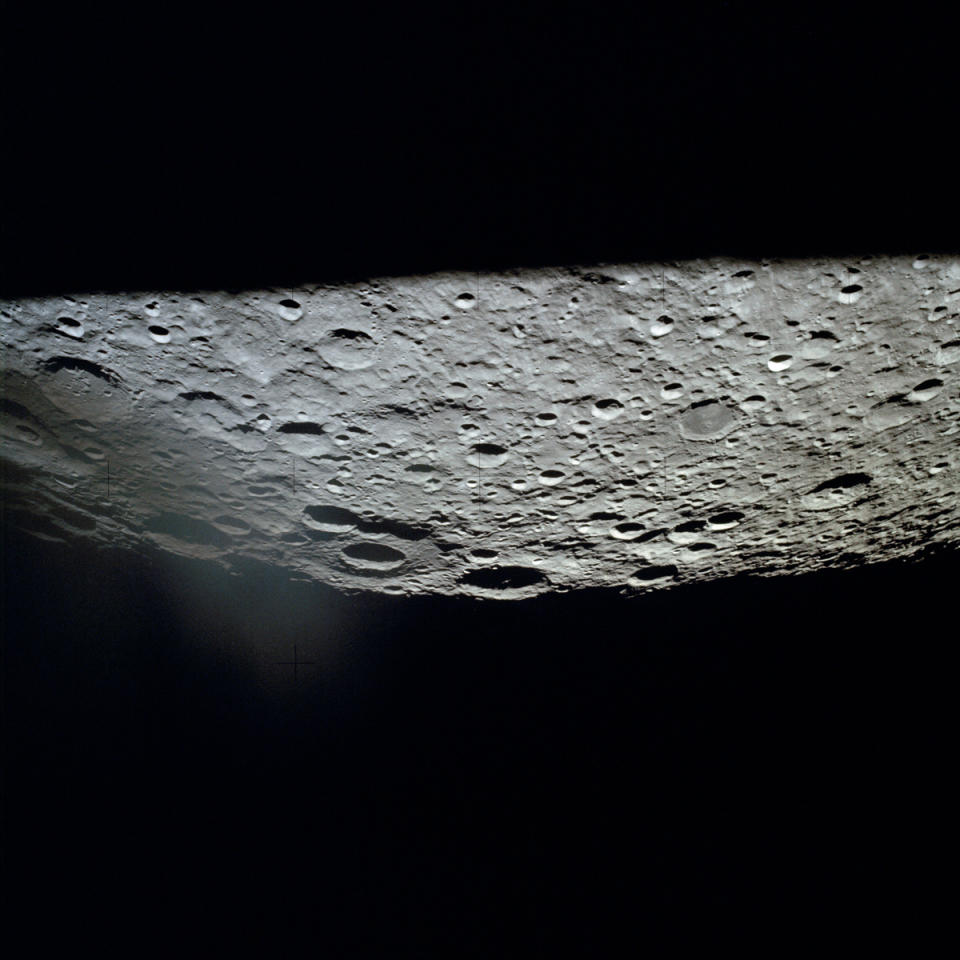 <p> Although the lunar landing was canceled, the Apollo 13 spacecraft did circle around the moon as the crew struggled to make it back to Earth, and the astronauts were able to capture closeup images of the lunar surface. In this photo, the large International Astronomical Union Crater No. 221 sits at the center on the horizon with another large crater to the south known as IAU No. 220. The image shows part of the lunar surface southeast of Mare Moscoviense. </p>