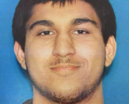 Arcan Cetin, 20, of Oak Harbor is seen in a Washington State Department of Licensing photo released by the Washington State Patrol after they announced his capture in relation to a mass shooting in Burlington, Washington, U.S. September 24, 2016. Washington State Patrol/Handout via Reuters