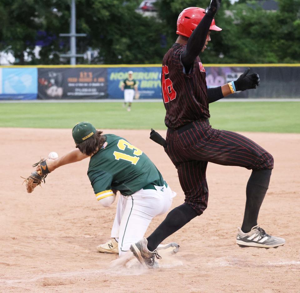Milton runner Marcus Ollivierre beats the throw at first base as King Philip's Max Robison can't make the catch in the MIAA Division 2 state championship game at Fitton Field in Worcester on Saturday, June 18, 2022.