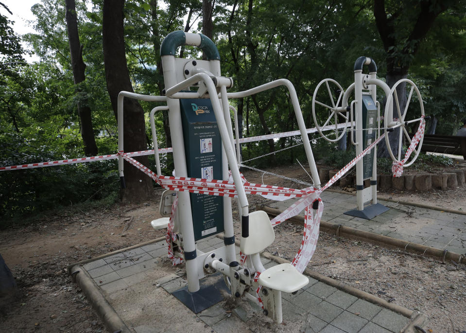 Fitness equipments are taped for the social distancing measures at a park in Seoul, South Korea, Friday, Sept. 11, 2020. (AP Photo/Lee Jin-man)