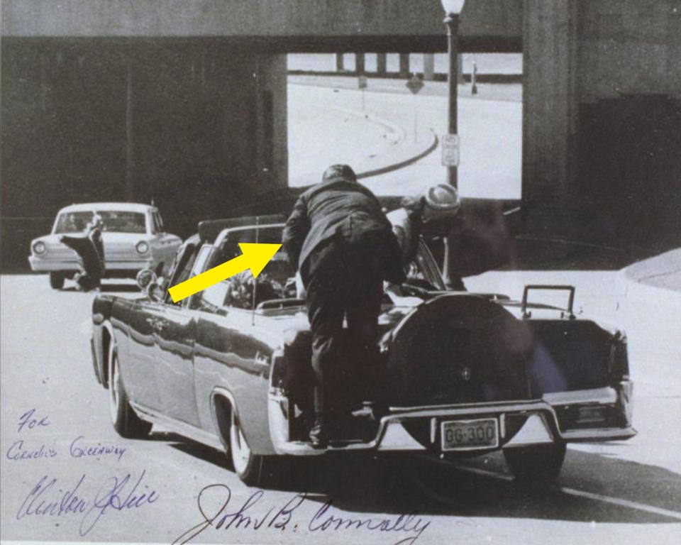 JFK's car as Hill Clint climbs in