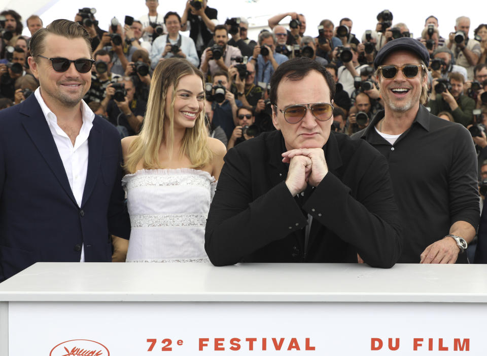 Actors Leonardo DiCaprio, from left, Margot Robbie, director Quentin Tarantino and actor Brad Pitt pose for photographers at the photo call for the film 'Once Upon a Time in Hollywood' at the 72nd international film festival, Cannes, southern France, Wednesday, May 22, 2019. (Photo by Vianney Le Caer/Invision/AP)