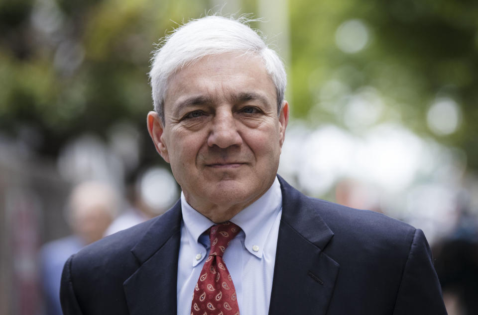 FILE - In this June 2, 2017, file photo, former Penn State President Graham Spanier departs after his sentencing hearing at the Dauphin County Courthouse in Harrisburg, Pa. A Pennsylvania judge will preside over the Wednesday, May 26, 2021 hearing in Harrisburg to determine if and when Spanier must report to jail to begin serving time for endangering the welfare of children. (AP Photo/Matt Rourke, file)