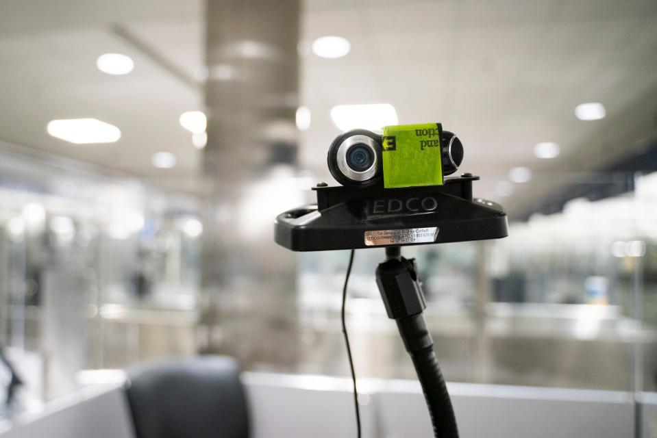 A camera uses facial recognition biometrics to verify international travelers entering U.S. Customs and Border Protection at McNamara Terminal at Detroit Metro Airport in Romulus on Friday, July 28, 2023.