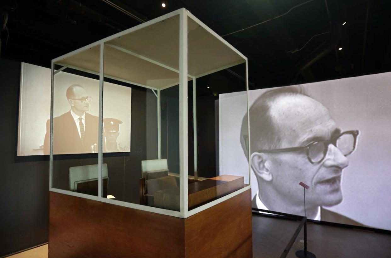 The bulletproof glass booth in which Adolf Eichmann (pictured) testified during his trial in Jerusalem. Richard Drew/AP