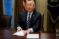 U.S. President Donald Trump speaks about his summit meeting in Finland with Russia's President Vladimir Putin at the start of a meeting with members of the U.S. Congress at the White House in Washington, July 17, 2018. REUTERS/Leah Millis