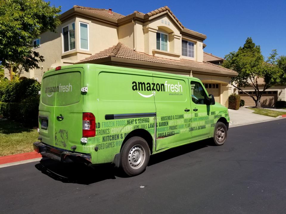 Amazon Fresh grocery delivery truck from the Amazon Prime service parked on a suburban street in San Ramon, California, July 5, 2018. (Photo by Smith Collection/Gado/Getty Images)