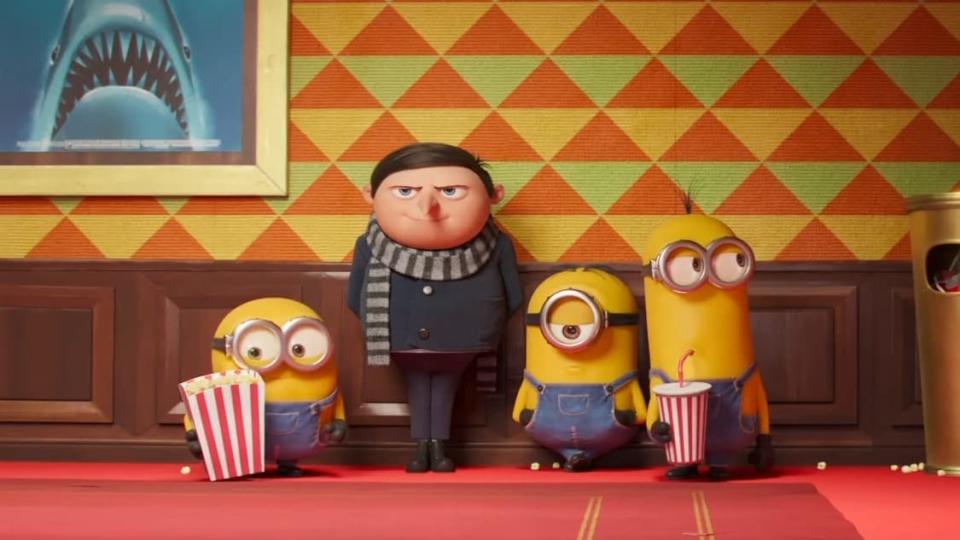 Young Gru stands against a wall with his minions
