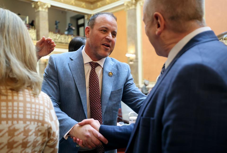 House Speaker Mike Schultz, R-Hooper, shakes hands with Rep. Doug Owens, D-Millcreek, on the first day of the general legislative session in the House chamber at the Capitol in Salt Lake City on Tuesday, Jan. 16, 2024. | Kristin Murphy, Deseret News