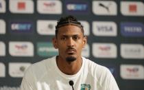 Ivory Coast's Sebastien Haller, listens to questions during a media conference, in Abidjan, Ivory Coast, Saturday, Feb. 10, 2024. Ivory Coast will play the African Cup of Nations soccer Final match against Nigeria on Sunday, Feb. 11, 2024. (AP Photo/Sunday Alamba)