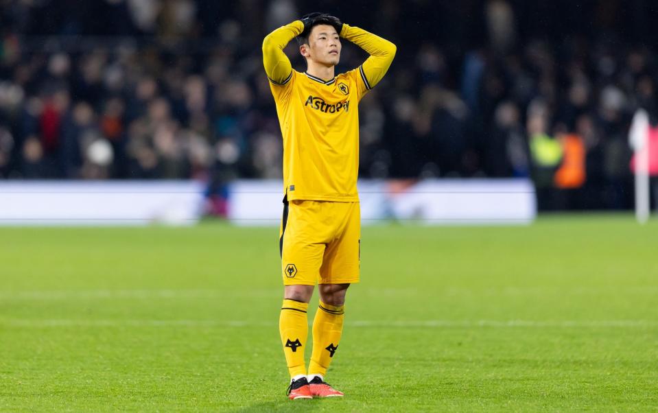 Hwang Hee-chan of Wolverhampton Wanderers looks on during their team's defeat during the Premier League match between Fulham FC and Wolverhampton Wanderers at Craven Cottage on November 27, 2023 in London, England