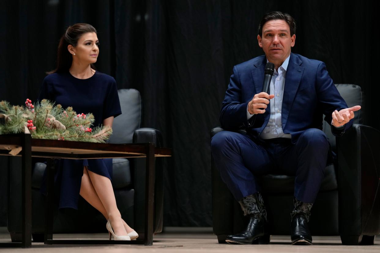 Republican presidential candidate Florida Gov. Ron DeSantis speaks as his wife Casey, left, looks on during U.S. Rep. Randy Feenstra's, R-Iowa, Faith and Family with the Feenstras event, Saturday, Dec. 9, 2023, in Sioux Center, Iowa.