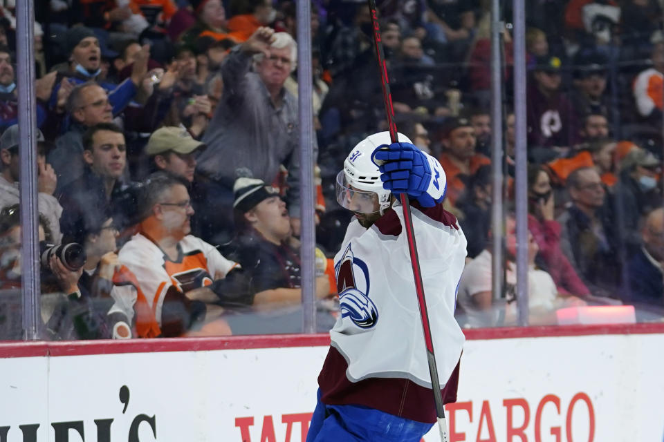 Colorado Avalanche's Nazem Kadri celebrates after scoring a goal during the third period of an NHL hockey game against the Philadelphia Flyers, Monday, Dec. 6, 2021, in Philadelphia. (AP Photo/Matt Slocum)