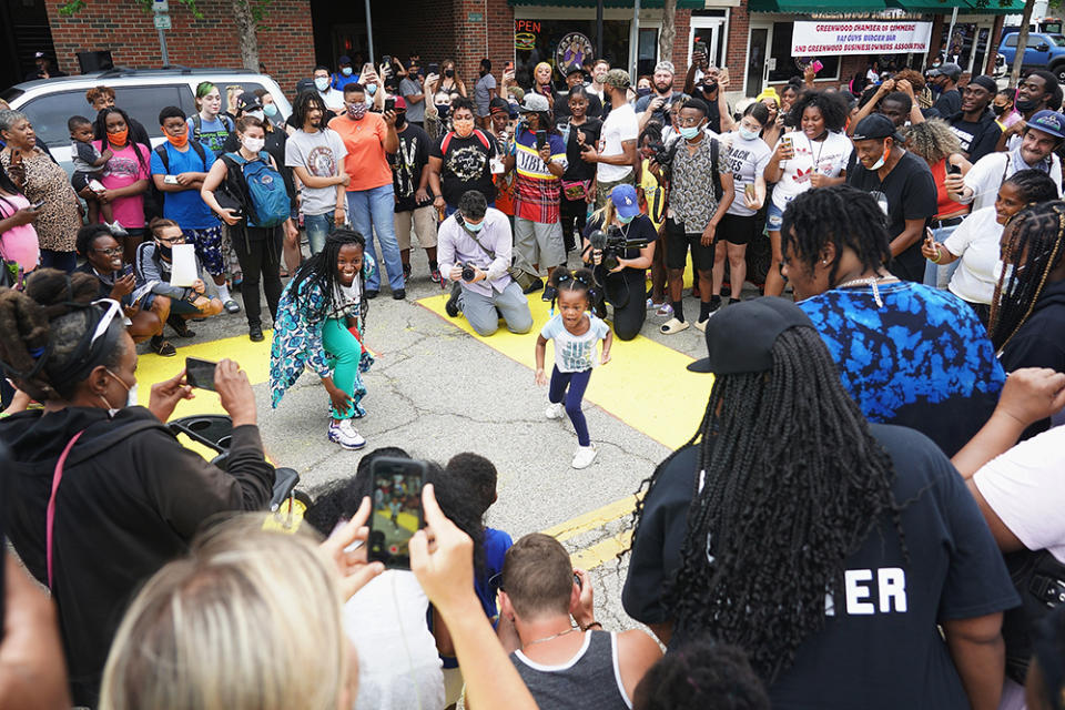 A young girl leads a dance routine in the street during a 2020 Juneteenth celebration in in Tulsa, Oklahoma. (Michael B. Thomas/Getty Images)