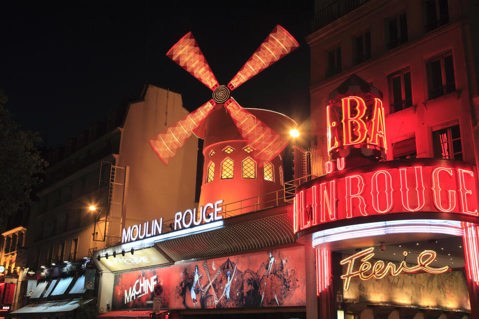 A file photo shows Paris' Moulin Rouge cabaret club, with its sails still in tact. / Credit: Bruce Yuanyue Bi/Getty