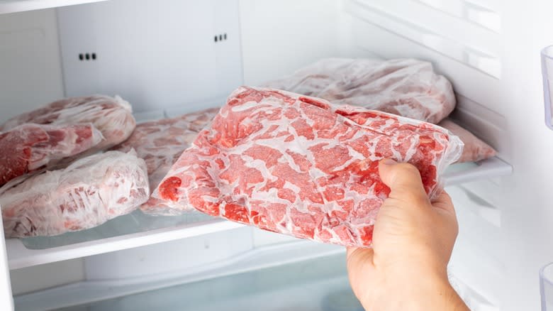 meat being taken out of a freezer