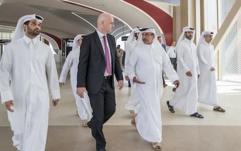 Gianni Infantino with Qatar officials in Doha - Credit: getty images