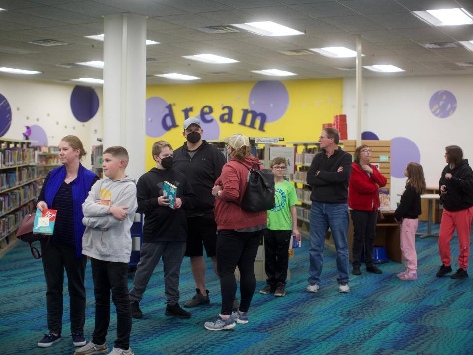 A steady line at the Marion Public Library formed of students and their families to meet New York Times Bestselling Author Chris Grabenstein Thursday.