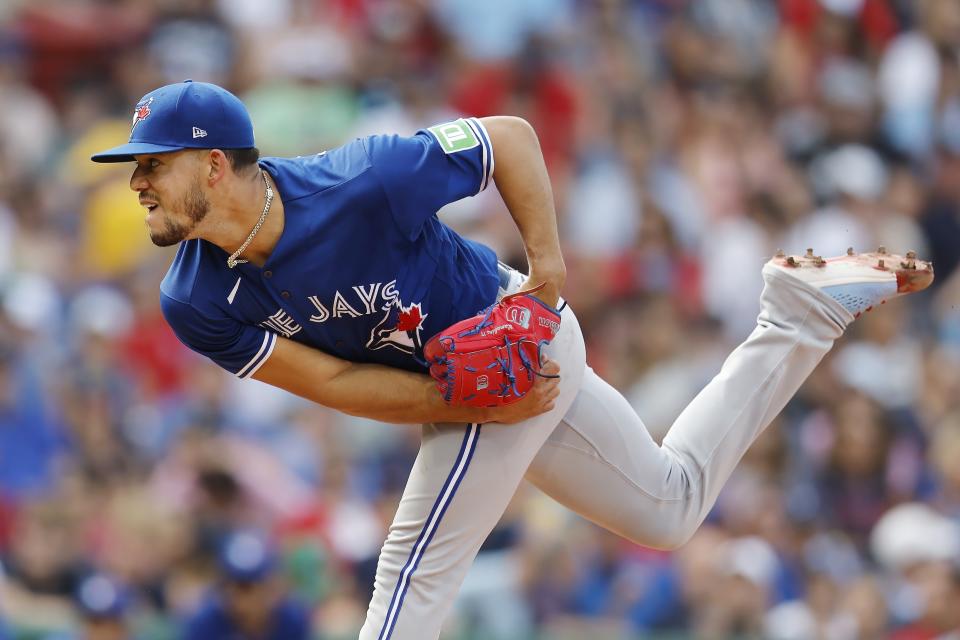 Toronto Blue Jays' Jose Berrios pitches during the first inning of a baseball game against the Boston Red Sox, Saturday, Aug. 5, 2023, in Boston. (AP Photo/Michael Dwyer)
