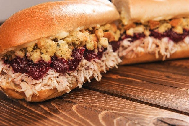 The Bobbie featuring turkey breast slow-roasted, in-house daily plus homemade stuffing, cranberry sauce and mayo served on a fresh-baked sub roll. It is a signature sandwich at Capriotti's Sandiwch Shop.