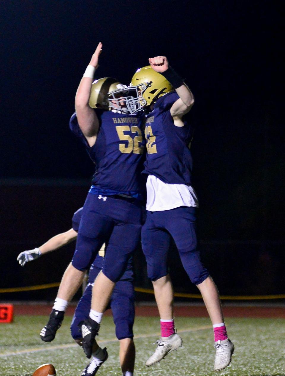 Hanover's Chase Brewster and Kyle McEachern celebrate a touchdown during Friday night's game against North Quincy held at Hanover Oct. 25, 2019.

Mike Borden/ for The Patriot Ledger