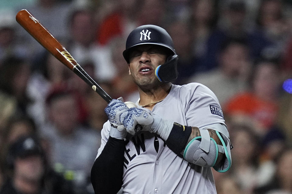 New York Yankees' Gleyber Torres is hit by a pitch from Houston Astros reliever Tayler Scott during the seventh inning of a baseball game Friday, March 29, 2024, in Houston. (AP Photo/Kevin M. Cox)