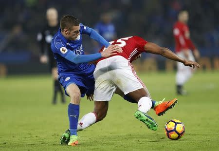 Britain Soccer Football - Leicester City v Manchester United - Premier League - King Power Stadium - 5/2/17 Manchester United's Antonio Valencia in action with Leicester City's Jamie Vardy Action Images via Reuters / Carl Recine Livepic