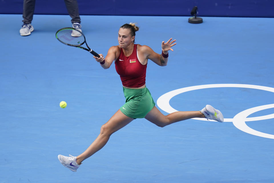 Aryna Sabalenka, of Belarus, returns to Donna Vekic, of Croatia, during second round of the tennis competition at the 2020 Summer Olympics, Monday, July 26, 2021, in Tokyo, Japan. (AP Photo/Patrick Semansky)