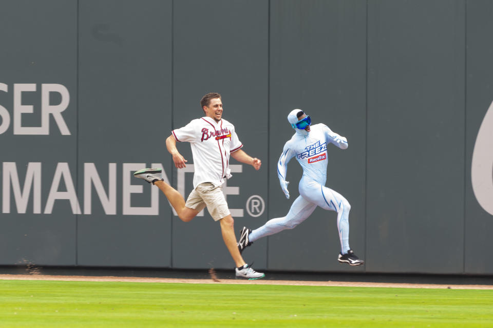 ATLANTA, GA - MARCH 29: A fan tries to Beat the Freeze during the game against the Philadelphia Phillies on Opening Day at SunTrust Park on March 29, 2018, in Atlanta, Georgia. (Photo by Patrick Duffy/Beam Imagination/Atlanta Braves/Getty Images) *** Local Caption ***