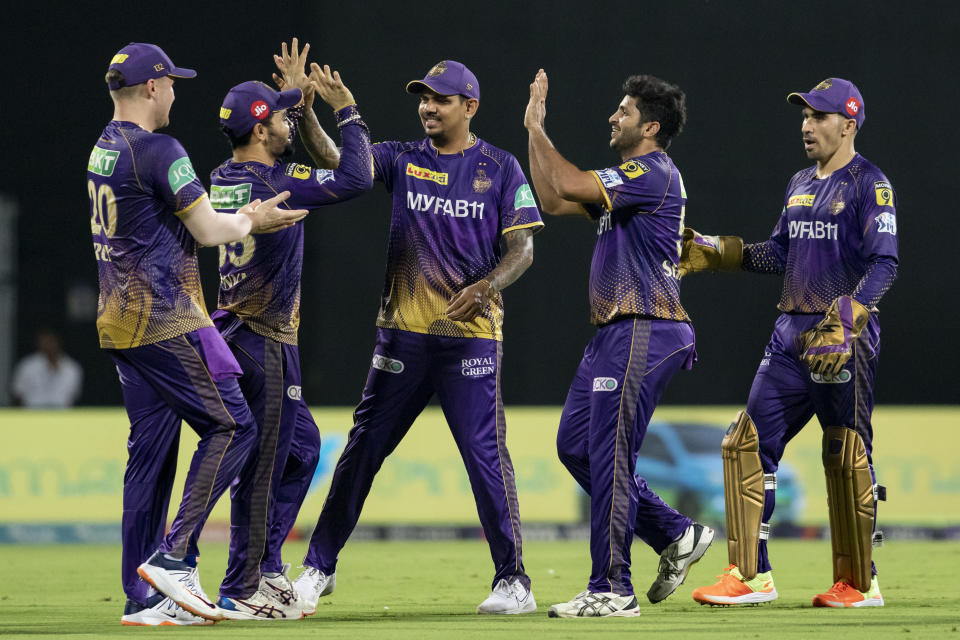 Kolkata Knight Riders' players celebrate the wicket of Chennai Super Kings' Devon Conway during the Indian Premier League cricket match between Kolkata Knight Riders and Chennai Super Kings in Chennai, India, Sunday, May 14, 2023. (AP Photo /R. Parthibhan)