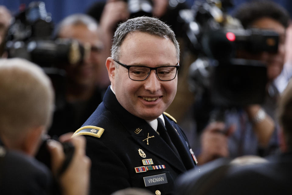 National Security Council aide Lt. Col. Alexander Vindman arrives to testify before the House Intelligence Committee on Capitol Hill in Washington, Tuesday, Nov. 19, 2019, during a public impeachment hearing of President Donald Trump's efforts to tie U.S. aid for Ukraine to investigations of his political opponents. (Shawn Thew/Pool via AP)