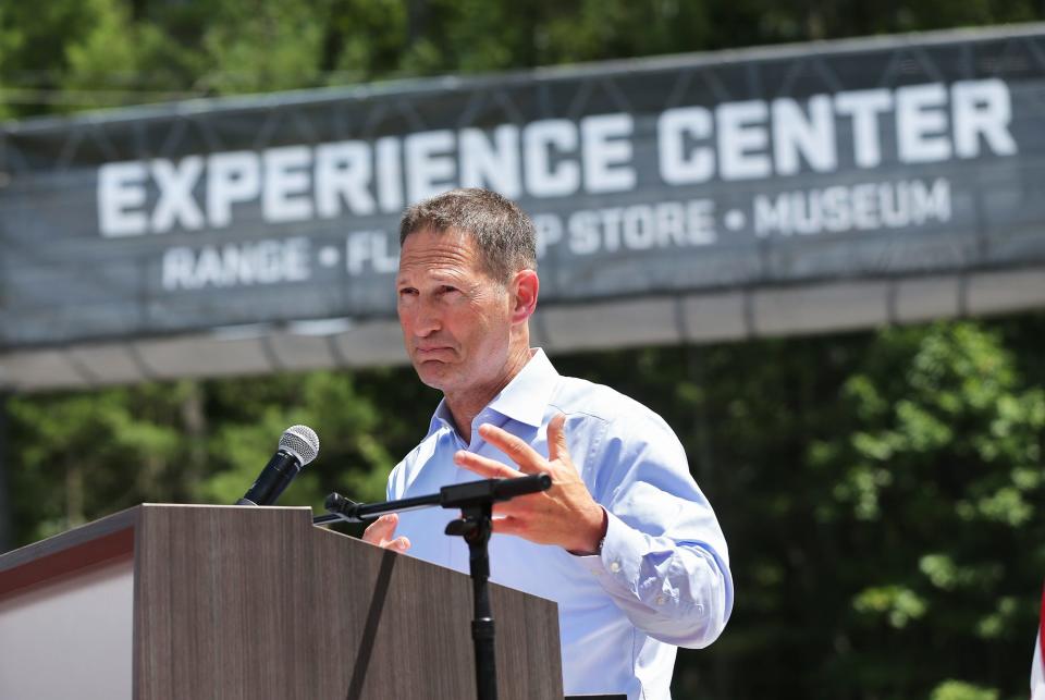 Ron Cohen, president of Sig Sauer, speaks about the employees of Sig and the dedication and passion they have during a speech at the opening of the Experience Center July 13, 2022.