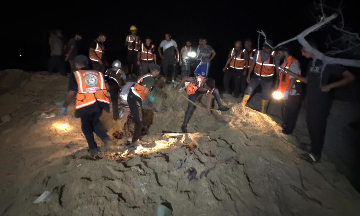 <span>A search and rescue operation after an Israeli airstrike on a tent encampment of displaced Palestinians in Al-Mawasi area of Khan Yunis, Gaza. The IDF said it was targeting a Hamas control centre.</span><span>Photograph: Anadolu/Getty Images</span>