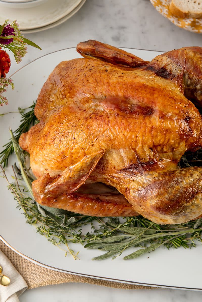 <p>Whether you're roasting your first bird or hosting for the 26th time, use this handy guide to roast the perfect festive turkey. This foolproof method has been tested (and tested and tested) by the Delish kitchen—and it's the best.</p><p>Get the <a href="https://www.delish.com/uk/cooking/recipes/a29557866/best-oven-roast-turkey-recipe/" rel="nofollow noopener" target="_blank" data-ylk="slk:Oven Roasted Turkey;elm:context_link;itc:0;sec:content-canvas" class="link ">Oven Roasted Turkey</a> recipe.</p>