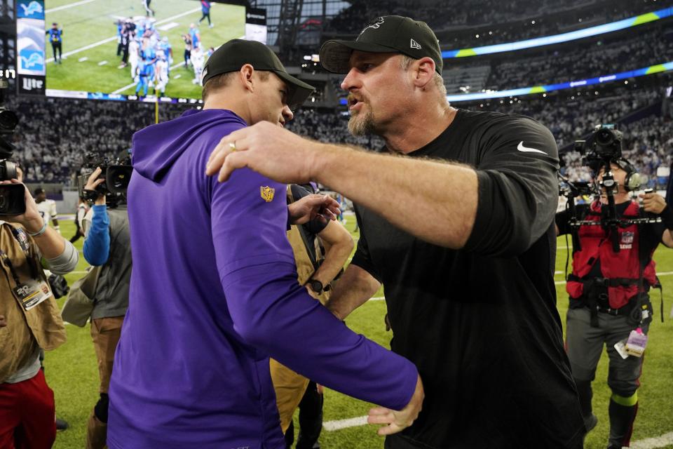 Vikings coach Kevin O'Connell and Lions coach Dan Campbell meet at midfield following the Lions' 30-24 win on Sunday, Dec. 24, 2023, in Minneapolis, to clinch the NFC North Division.