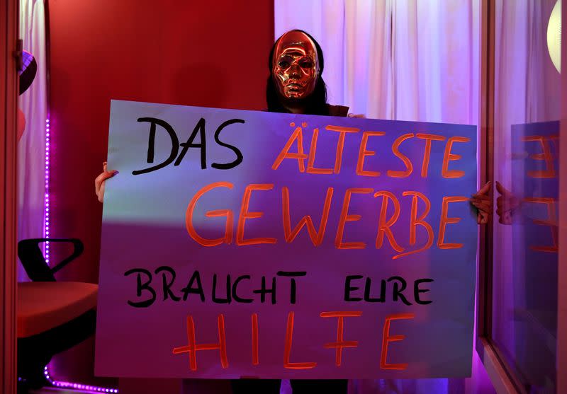 Prostitutes hold a rally in Hamburg demanding the reopening of Germany's brothels