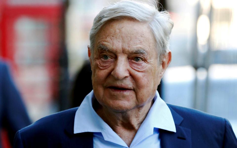 The Hungarian-born billionaire financier George Soros has accused his government of lying over claims he helped orchestrate mass migration into the EU - REUTERS