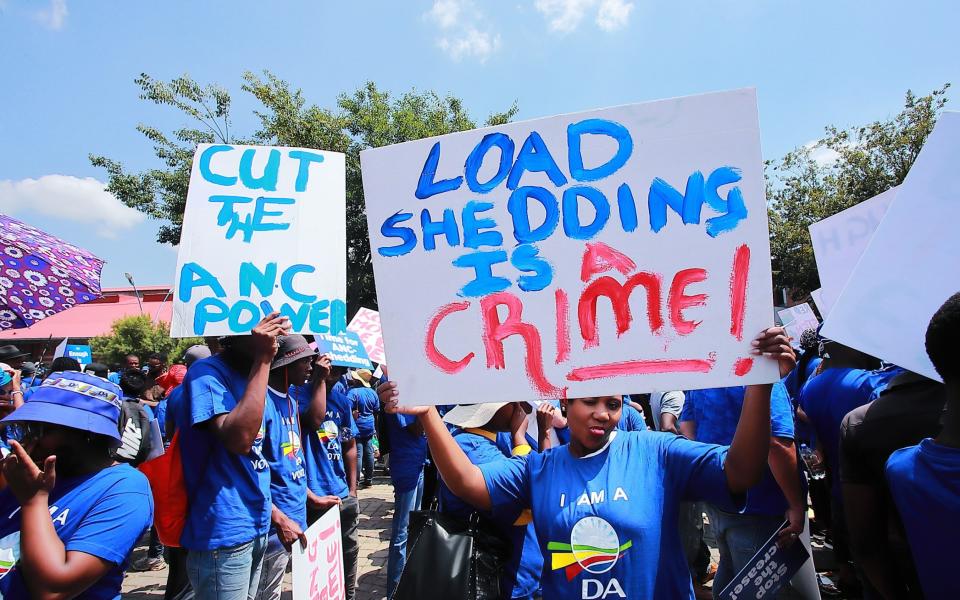 Democratic Alliance members marching on the streets of Johannesburg against load shedding blackouts - Fani Mahuntsi/Gallo Images via Getty Images