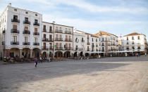 Cáceres is a mish-mash of cultures: the city was founded by the Romans, yet it’s dotted with medieval streets and Renaissance palaces and surrounded by Moorish city walls. The Old Town is a UNESCO World Heritage Site, and the whole town itself is not only foodie heaven (it was named the 2015 gastronomy capital of Spain by the Spanish Hospitality Federation), but is also just far enough out of the way to remain relatively tourist-free. The Route: Since the rail route was shut down, getting to Cáceres from Lisbon takes a while—the bus journey is a five-hour trip. Nonetheless, it'll cost less than $20 with <a rel="nofollow noopener" href="http://www.goeuro.co.uk/buses_from_caceres_to_lisbon" target="_blank" data-ylk="slk:​GoEuro;elm:context_link;itc:0;sec:content-canvas" class="link ">​GoEuro</a> and will take you through some of the most stunning countryside in Iberia. Where to Stay: The ​<a rel="nofollow noopener" href="http://www.paradores-spain.com/spain/pcaceres.html" target="_blank" data-ylk="slk:​Hotel Parador;elm:context_link;itc:0;sec:content-canvas" class="link ">​Hotel Parador</a>, which is part of that UNESCO Heritage Old Town, feels more like a palace than a hotel, which probably comes from the fact that it actually is one. Where to Eat: Cuisine is what Cáceres does best, and ​<a rel="nofollow noopener" href="http://www.tripadvisor.co.uk/Restaurant_Review-g227852-d3188537-Reviews-Javier_Martin-Caceres_Province_of_Caceres_Extremadura.html" target="_blank" data-ylk="slk:​Restaurant Javier Martin;elm:context_link;itc:0;sec:content-canvas" class="link ">​Restaurant Javier Martin</a> offers up a sterling tasting menu from one of the freshest and most exciting new chefs in town. What to Do: Take a walk around the Old Town. In addition to being unspeakably beautiful, the area is home to market stalls and boutique shops selling all the sweets, wines, liqueurs, and street food a traveller could ever want.